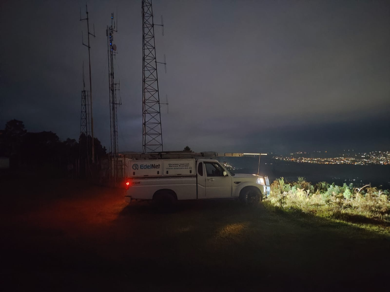 EdelNet support vehicle at a wireless high site after dark
